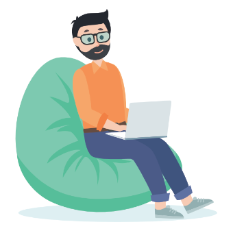 man typing on computer on bean bag