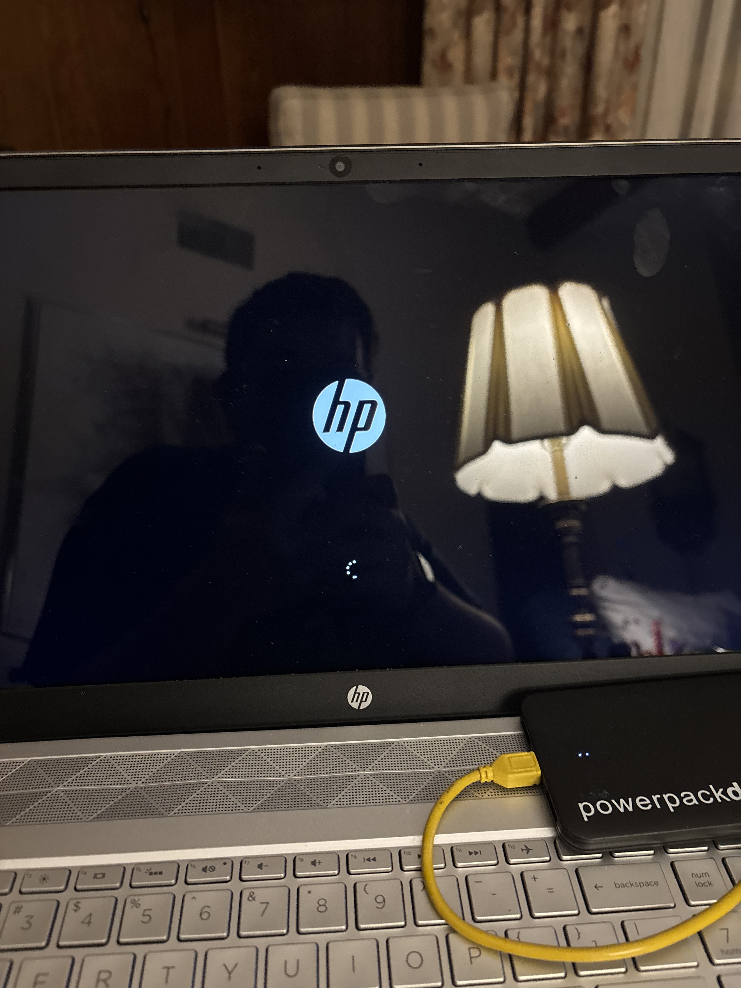 Laptop showing Windows starting